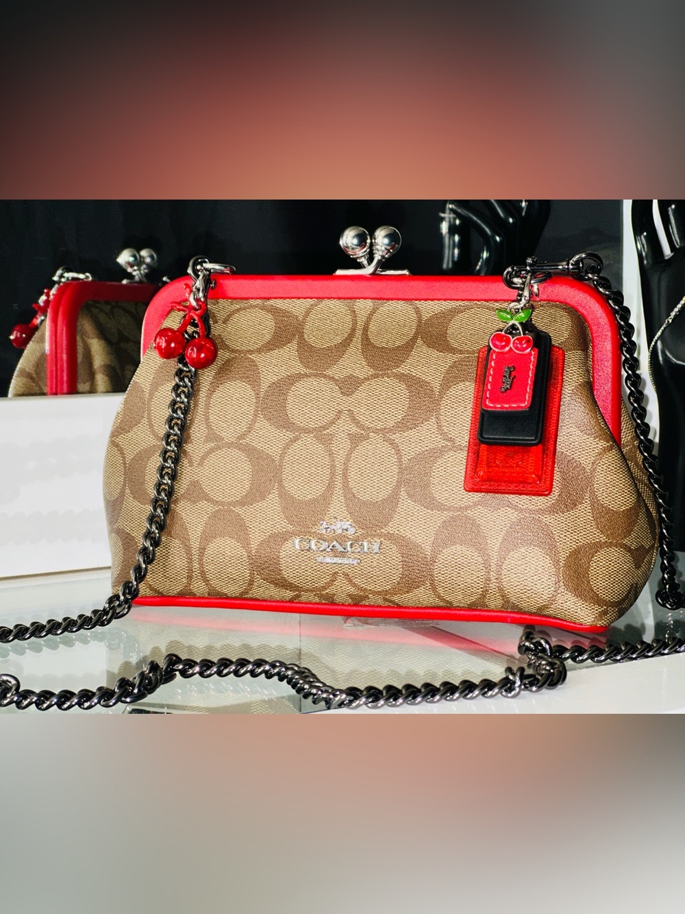 Coach Nora Kisslock Crossbody in Signature Canvas